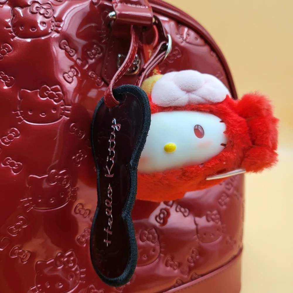 Hello Kitty Red Embossed Satchel with Character Charms..Original..GM size...